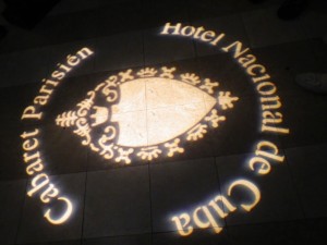 This logo was projected in lights on the dark floor at the entrance to Cabaret Parisien
