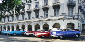 Old cars, most used as taxis, line up outside our downtown Havana hotel